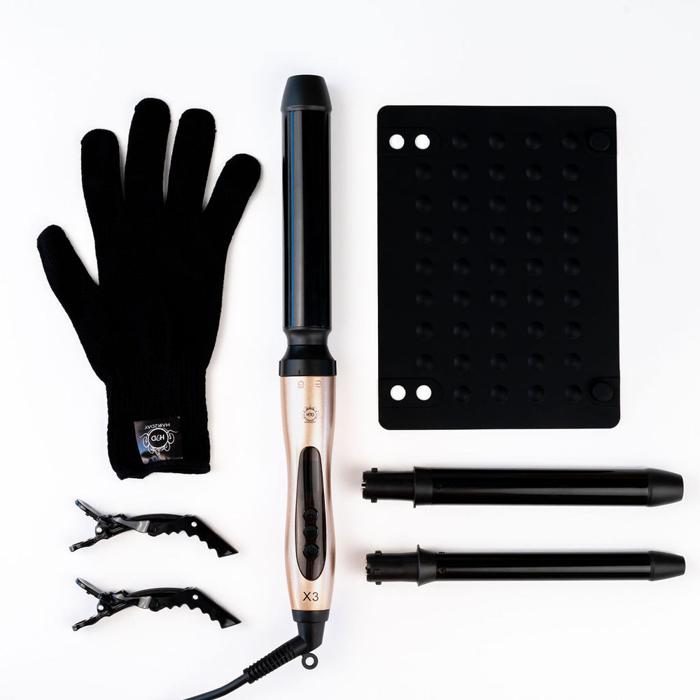 H2D Rose Gold X3 Curling Wand set with heat-resistant glove, heat mat, sectioning clips and interchangeable barrels